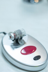 Medical equipment automatic mixer for mix small vials of liquid.