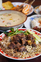 Rawon Solo, Central Java, Indonesia, captured on July 13, 2025. Traditional beef soup with black keluak broth, served with rice, bean sprouts, salted egg, and sambal for rich Javanese flavor