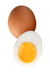 Front view of raw brown chicken eggs and cooked or boiled chicken egg with egg yolk in half in stack isolated on white background with clipping path