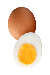 Front view of raw brown chicken eggs and cooked or boiled chicken egg with egg yolk in half in stack isolated with clipping path in png file format
