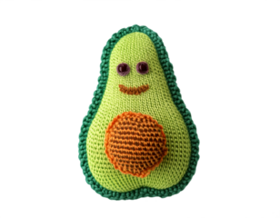 A delightful, knitted avocado toy with a charming smile and vibrant colors against a transparent background.