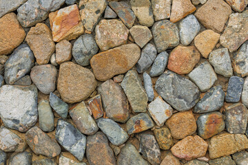 Natural stone wall textured background. Stone wall,Texture of a wall built