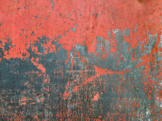 weathered rusty metal surface with peeling red paint. highly detailed textured background.