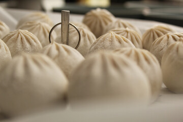 Uncooked Frozen Dumplings Ready to Be Steamed