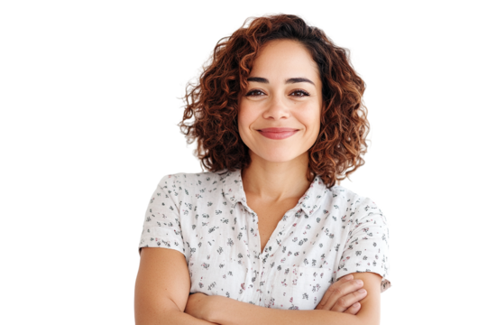 A young woman with curly brown hair smiles confidently with her arms crossed isolated on transparent background - Powered by Adobe