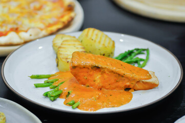 grilled salmon,salmon steak or fish steak and salad