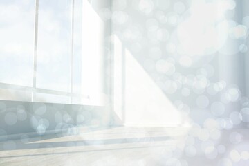 Twinkling lights over room with window