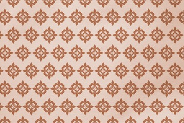 Repeating geometric floral motif pattern is appearing on flat design wallpaper with diamond links