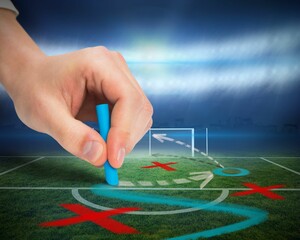 Hand drawing tactics on football pitch