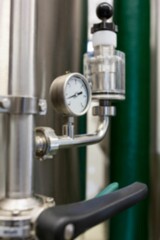 Gauge dail on machinery in distillery