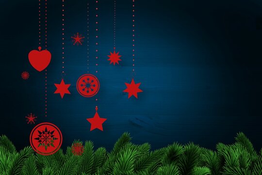 Christmas baubles in front of wood