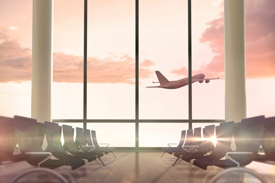 Fototapeta Airplane flying past departures lounge window