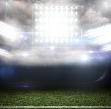 Fototapeta Showing flat-design field with green turf boundary under floodlights casting lens flares in mist