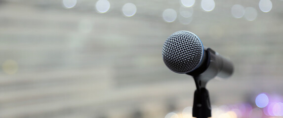 Close-up microphone for press conference speaker reports interview concepts or broadcasting public speaking speech presentation stage performance and reporter news with empty copy space background.
