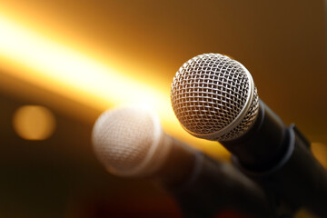 Close-up microphone for press conference speaker reports interview concepts or broadcasting public speaking speech presentation stage performance and reporter news with empty copy space background.