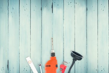 DIY tools on wooden background