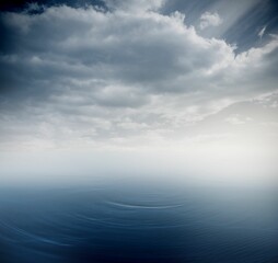 Minimalistic flat design seascape is showing calm sea water rippling under overcast cloudy sky