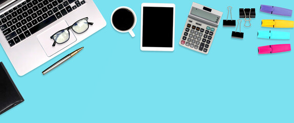 Top view desk office workspace with equipment on empty copy space for freelance working productive workplace area or home office flat lay background.