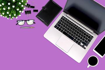 Top view desk office workspace with equipment on empty copy space for freelance working productive workplace area or home office flat lay background.