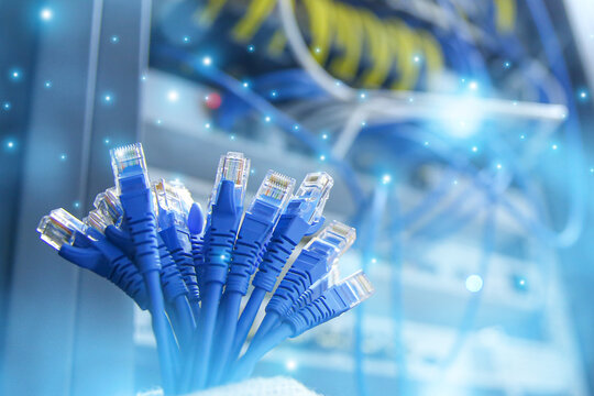 A lot of LAN internet network cable or RJ45 UTP Cat6 fiber optic Ethernet cables for cloud computing computer data link file transfer or wifi connect server networking devices technology system.