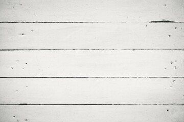 white painted wooden plank surface is showing flat design grain texture with nail holes, wear marks