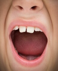 Close up of yawning child