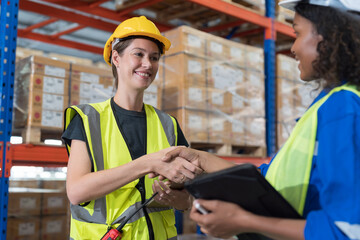 Group of warehouse worker join hands together, meeting, Work completed successfully. Collaboration...
