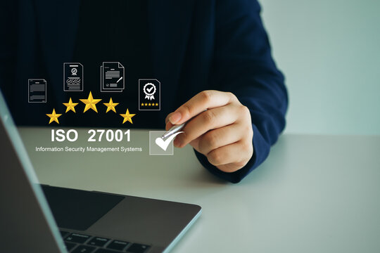 ISO 27001 concept. Businesswoman with ISO 27001 certified for information security management system (ISMS). requirements, certification, management, standards