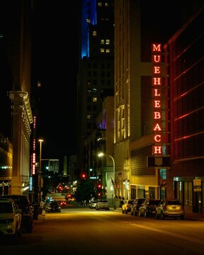 Muehlebach Hotel sign at night in downtown Kansas City, Missouri