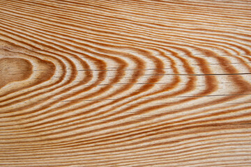 Parallel wood grain veins on a wooden board, side view  perspective soft focus close up