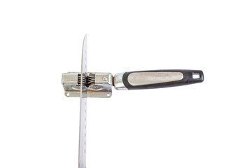 Vintage knife sharpener with a santoku chef knife, top view isolated on white background