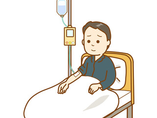 病室で病気の心配をする男性