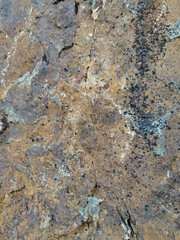 Natural gray brown rough grunge grainy stone texture background, backdrop