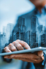 Tablet and City Buildings
