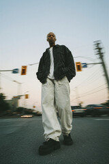 Man Standing in Street