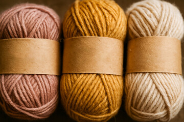 Minimalist Yarn Balls Flat Lay – Pinkish Tan, Mustard Yellow, and Cream with Label Wraps