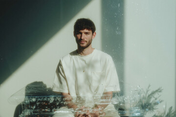 Man Sitting in a Bright Room