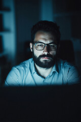 Man Working in the Dark