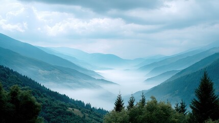 Fototapeta premium Serene Mountain Landscape with Misty Valleys and Overcast Sky, Capturing the Beauty of Nature's Tranquility and Depth
