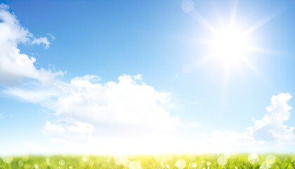 Bright sunny sky with white clouds and green grass under fresh spring day glow
