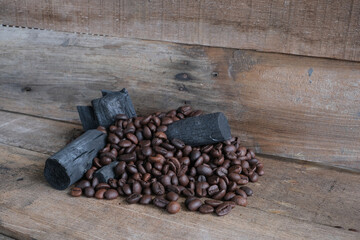 Coffee beans on a wooden background