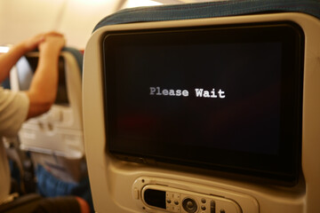 Waiting for in-flight entertainment on a long journey
