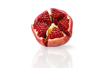 Sliced pomegranate isolated on white background with natural shadow and reflection. High-quality PNG with transparent background, showing juicy red seeds and vibrant fruit texture. Perfect for food de