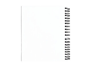 Blank spiral notebook on black background
