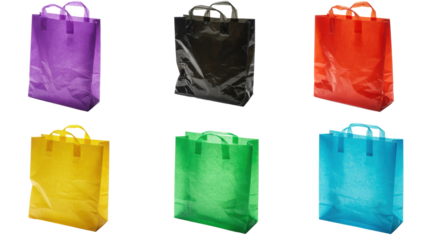 Six empty, crinkled plastic shopping bags in purple, black, red, green, yellow, and blue, statically arranged on a transparent background with extensive copy space, studio lighting, high-angle