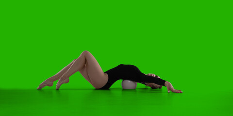 Rhythmic gymnastic woman on green screen background.