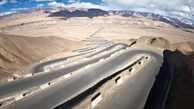 Panlong Ancient Road in Xinjiang, China &ndash; Aerial View of Winding Mountain Highway Like a Dragon Super fast video
