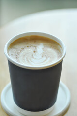 hot cofffee, cappuccino coffee or latte coffee in paper glass