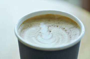 hot cofffee, cappuccino coffee or latte coffee in paper glass
