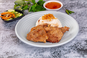 Roasted pork steak with rice